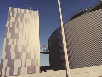 Low angle view of office building against sky