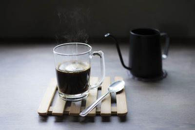 Close-up of coffee cup on table