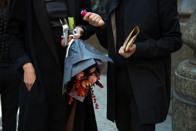 Close-up of couple holding hands