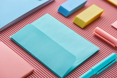 High angle view of colorful papers on table