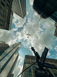 Low angle view of cityscape against sky