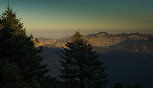 Scenic view of mountains against sky during sunset