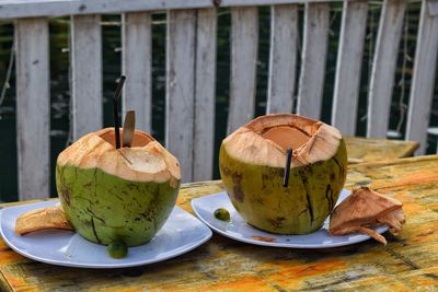 Close-up of fruits in plate on table