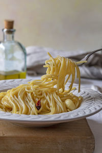 Close-up of noodles in plate on table