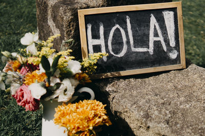 Close-up of text on white wall