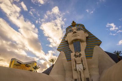 Low angle view of statue against sky