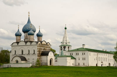 View of temple against building