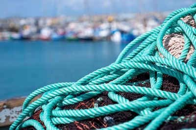 Fishing ropes after a good morning catch lying on the edge of the port