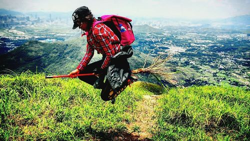 Woman jumping in water