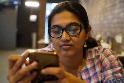 Portrait of woman holding ice cream