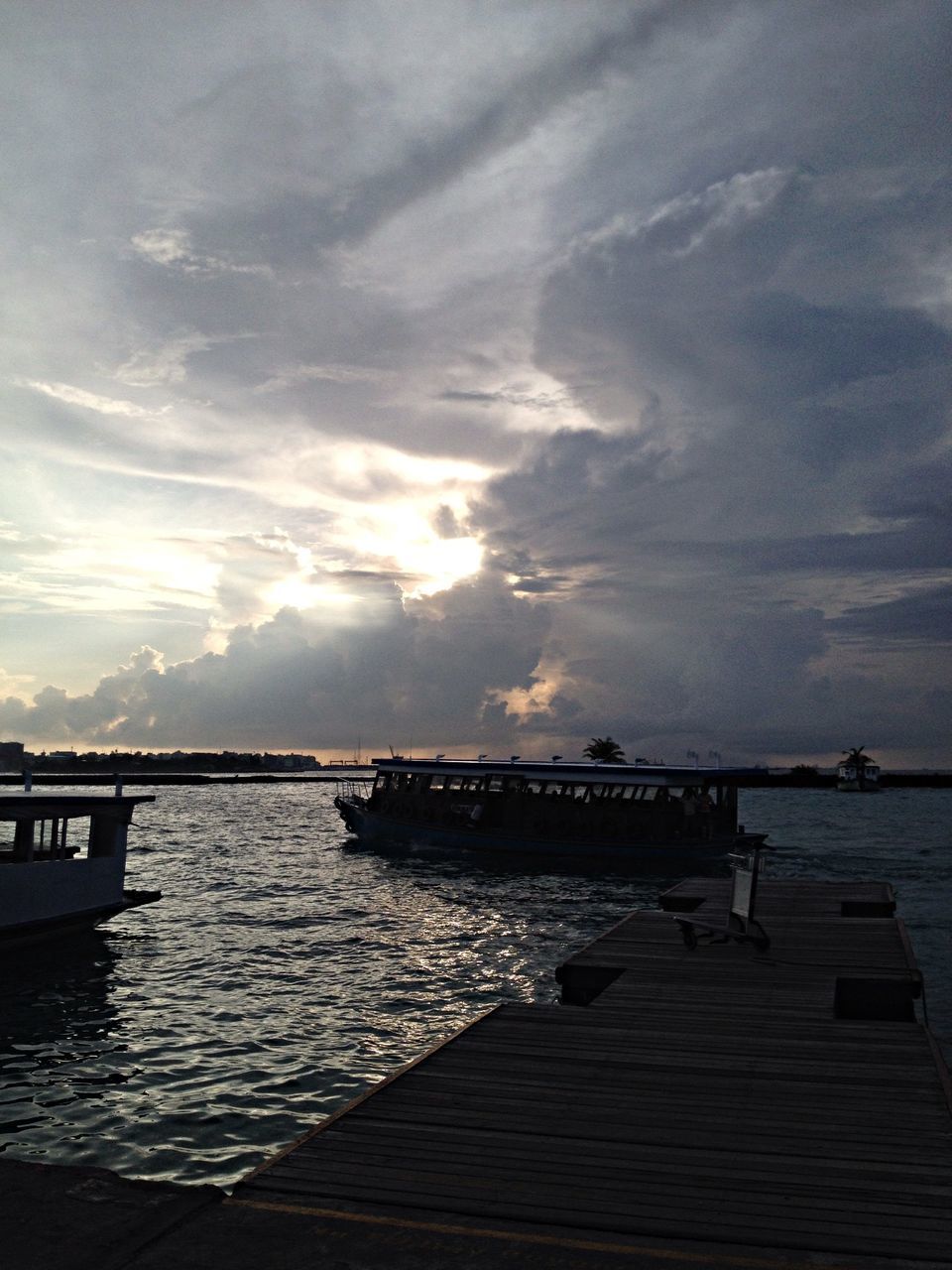 water, sky, sea, pier, cloud - sky, tranquil scene, scenics, tranquility, sunset, beauty in nature, wood - material, horizon over water, nature, jetty, cloud, cloudy, railing, idyllic, sunlight, outdoors