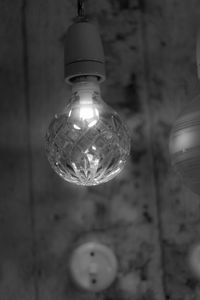 Close-up of illuminated light bulb