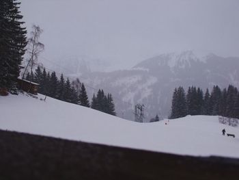 Scenic view of snow covered mountains