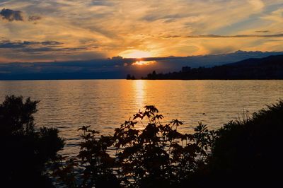 Scenic view of sea against sky during sunset