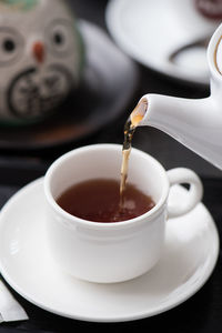 Close-up of coffee cup on table