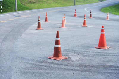 Traffic cones on road in city