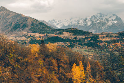 Scenic view of mountains against sky during autumn