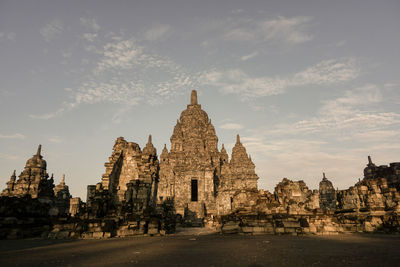 View of historic buildings in city against sky