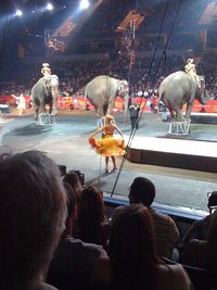 View of woman in dark room