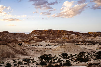 Rock formations in desert against sky