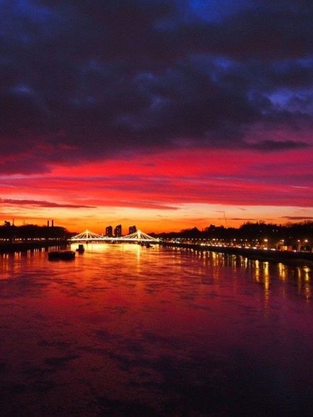 sunset, water, sky, orange color, waterfront, cloud - sky, illuminated, reflection, scenics, nautical vessel, lake, dramatic sky, river, tranquil scene, beauty in nature, tranquility, dusk, transportation, boat, cloud