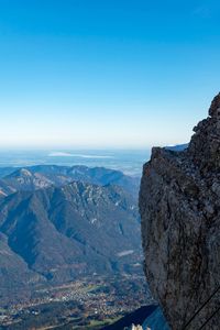 Scenic view of mountains against clear blue sky