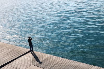 High angle view of man on sea shore