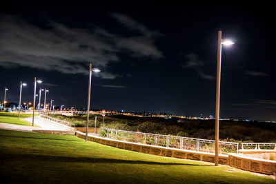 Illuminated street lights at night