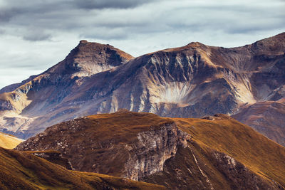 Panoramic view of rocky mountains against sky