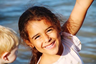 Portrait of smiling girl in water