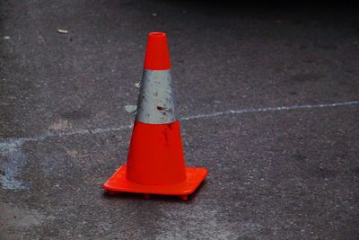 High angle view of red umbrella on street
