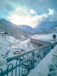 Scenic view against sun and snowcapped mountains on a winter day in pfelders, alto adige 