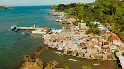 Houses community standing in water in fishing village. city port on balabac island