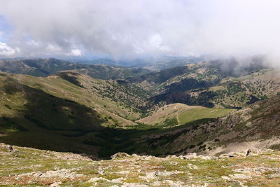 Scenic view of valley against sky