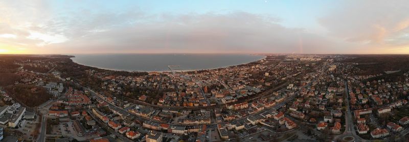 High angle view of city at sunset