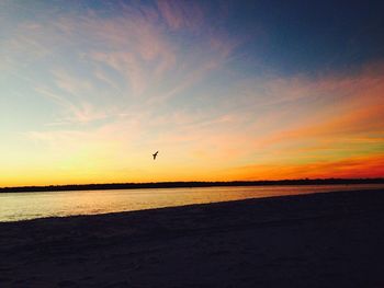 Scenic view of sea during sunset