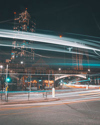 Light trails on city street at night