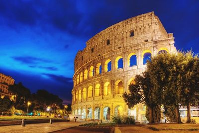 View of coliseum against sky at night