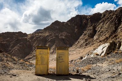 Built structure on mountain against sky