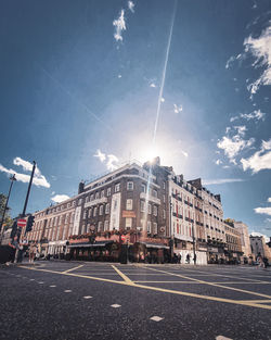 Buildings in city against sky