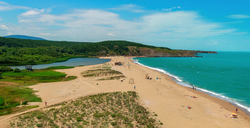 Scenic view of beach against sky