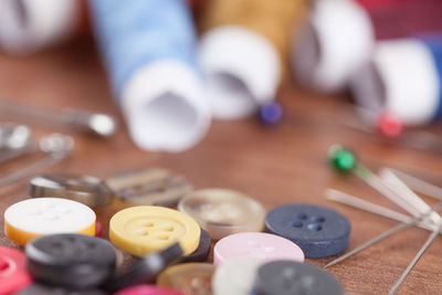 Close-up of sewing items on table