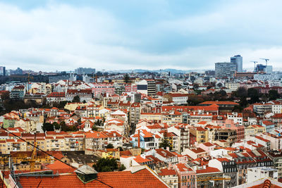 Aerial view of cityscape against sky