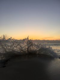 Scenic view of mountains against sky during sunset