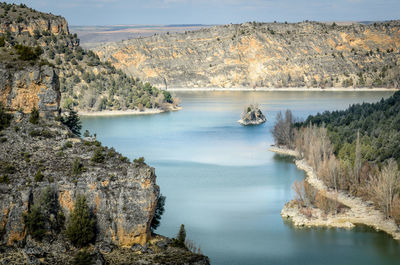 Scenic view of river and mountains