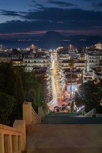 High angle view of illuminated buildings in city at night