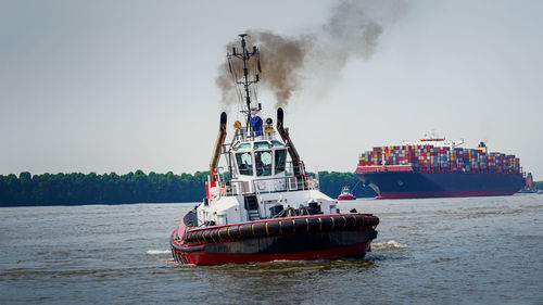 Large container ship arrives in hamburg