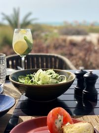 Close-up of fruits in bowl on table