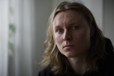 Portrait of thoughtful woman looking at camera