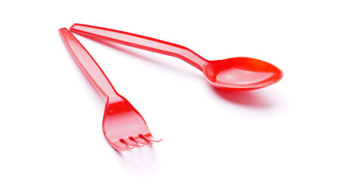 High angle view of red chili pepper on white background